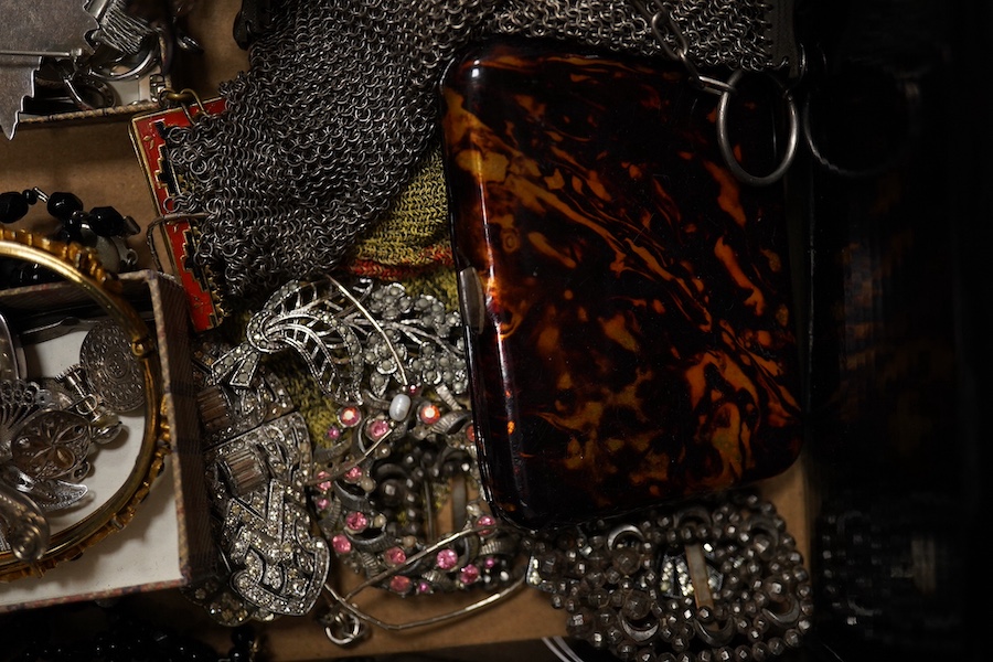 A quantity of assorted mainly costume jewellery including paste set brooches, necklaces, 925 items including pill box pendant, bracelet and coin set jewellery, a lacquer cigarette case and two evening purse, etc. Conditi